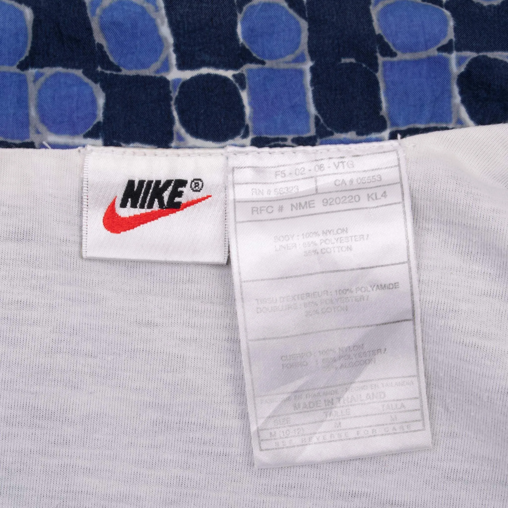 VINTAGE NIKE CLASSIC SWOOSH BLUE WINDBREAKER WOMAN JACKET 1990S SIZE MEDIUM